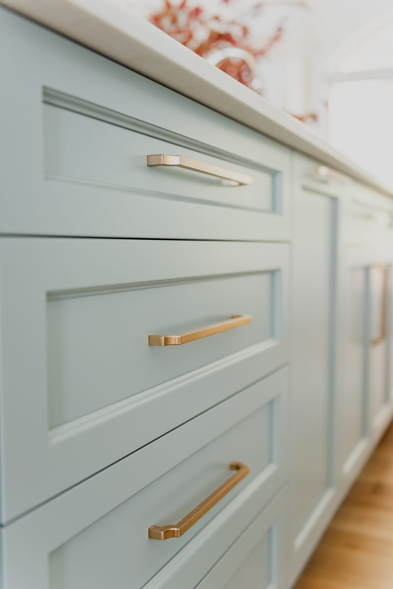 gold cabinet hardware blue cabinetry