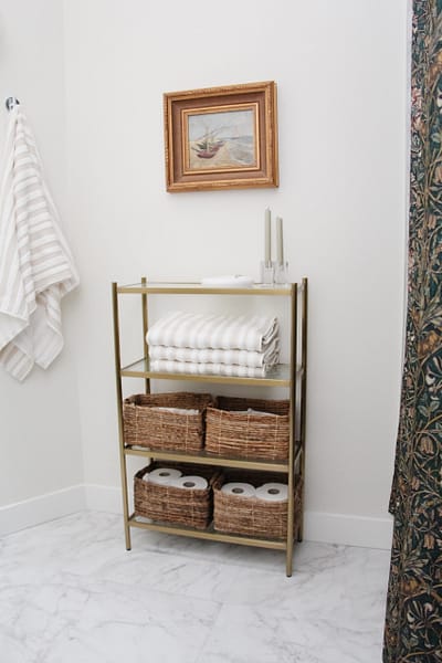 contemporary kids bathroom with etegere and gold accents