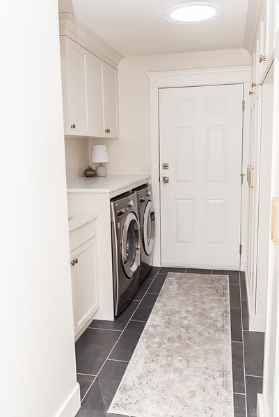 Cream mudroom Laundry room shiplap backsplash