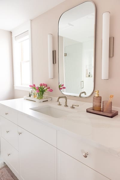 pink bathroom, white vanity