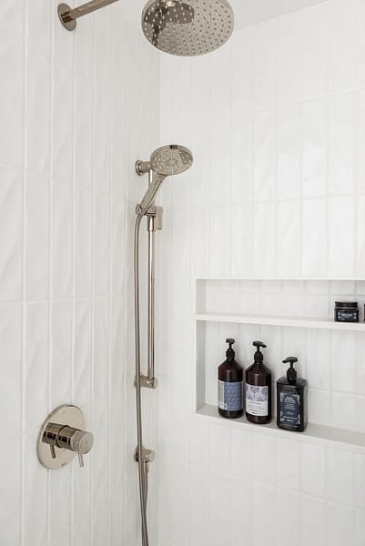 vertical textured subway tile shower, shower niche
