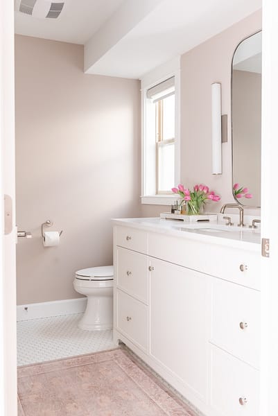 pink bathroom, white vanity