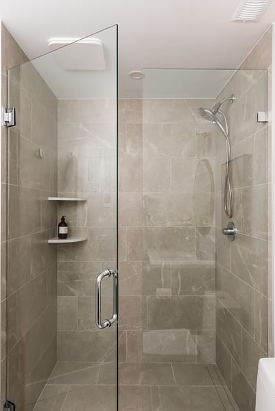 basement bathroom with walk in shower