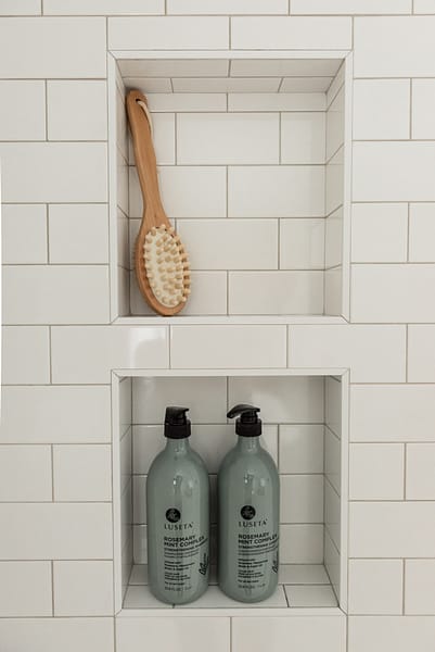 subway tile shower surround and niche