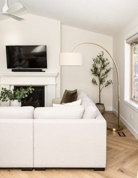 transitional living room, cast stone fireplace