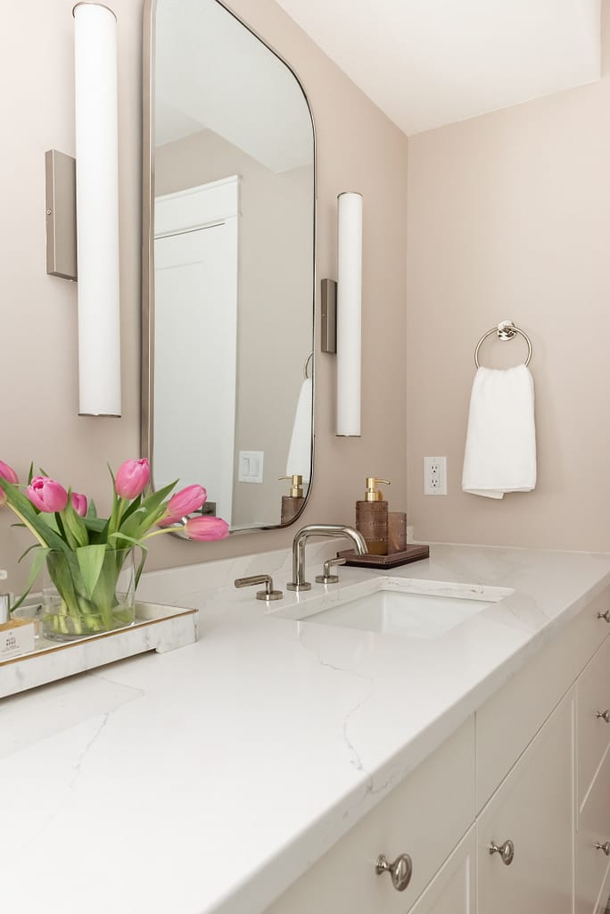 pink bathroom, white vanity