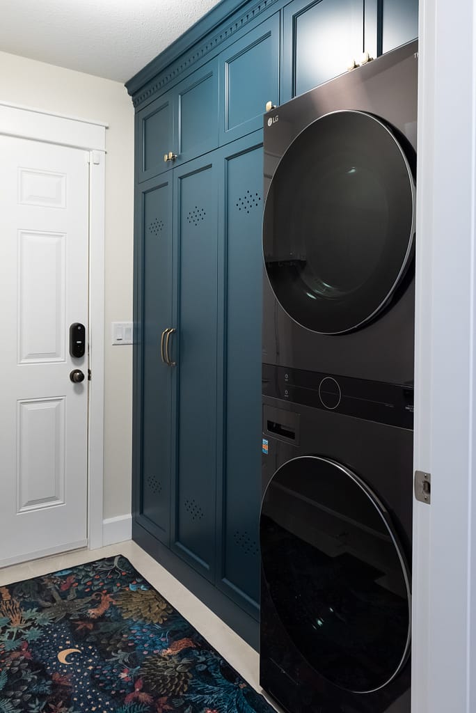 custom vent holes in cabinetry locker blue laundry mudroom combo