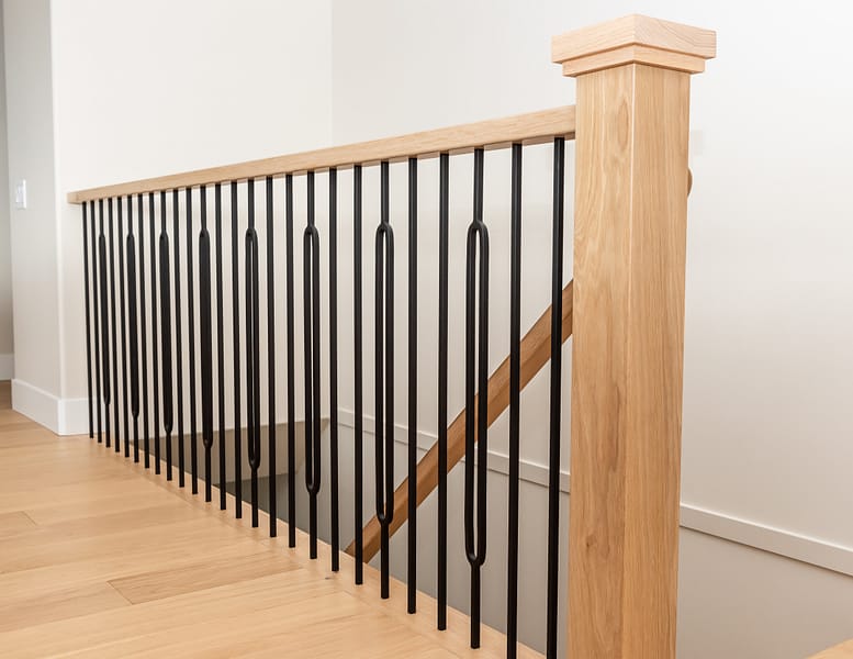 White oak railing with round black spindles