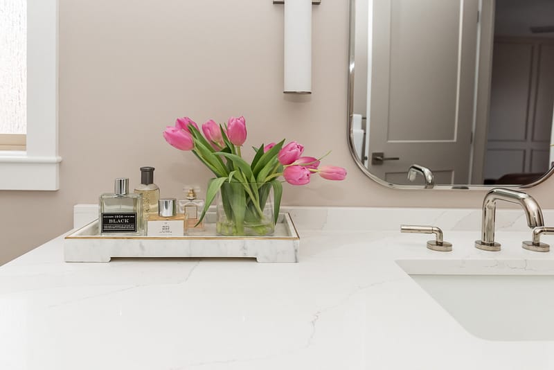bathroom countertop styling, perfume, pink tulips
